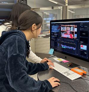 student editing video