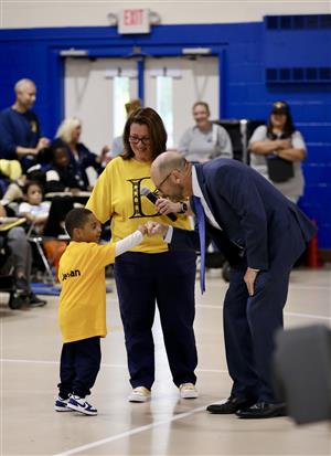 Dr Lerner greeting a student at the Bleshman Appreciation Event