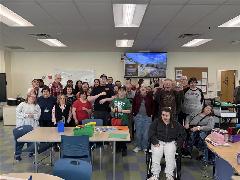 Clients pose as a group