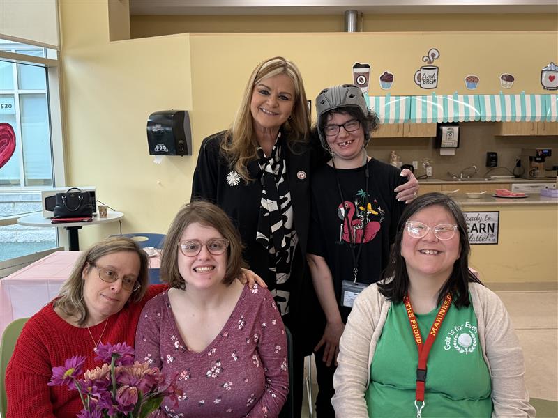 Clients with special guest for International Women's Day