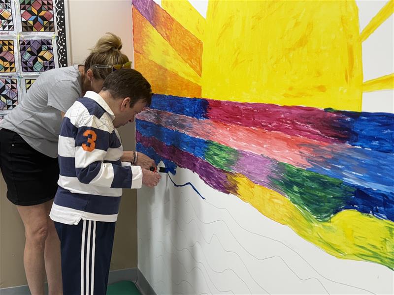 Client paints a mural